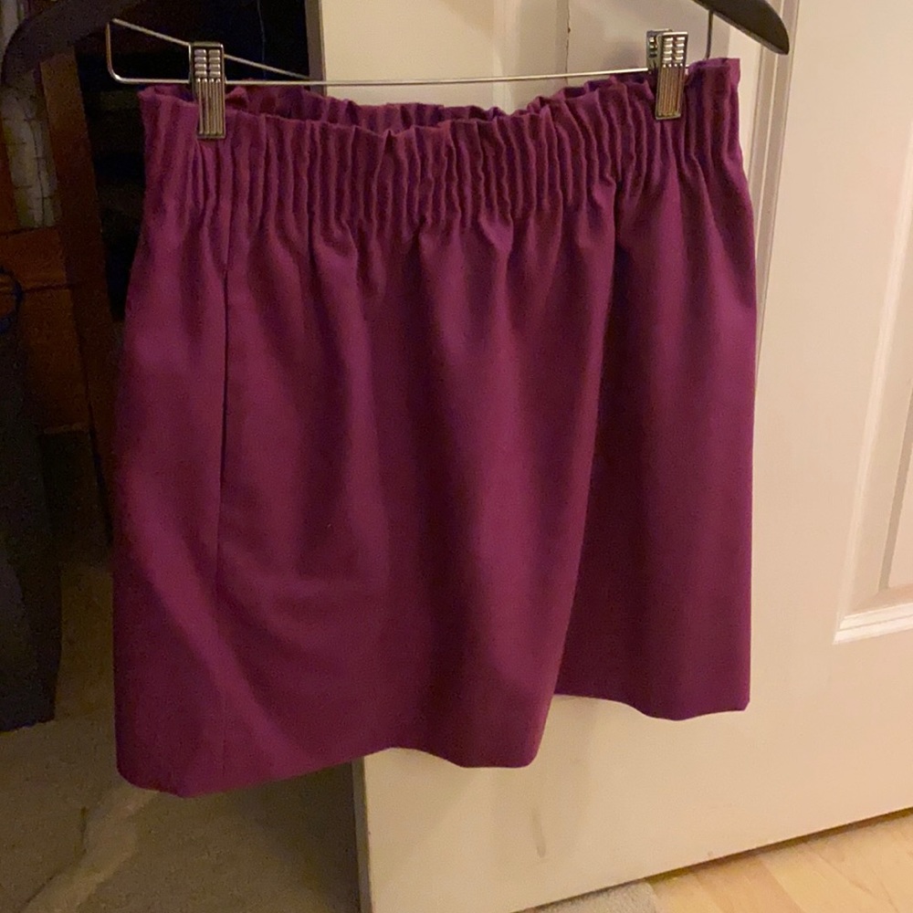 Stretch purple wool mini skirt with pockets